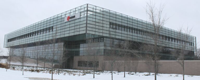 Facade of the Lear Corporation headquarters in Southfield, Michigan in winter.