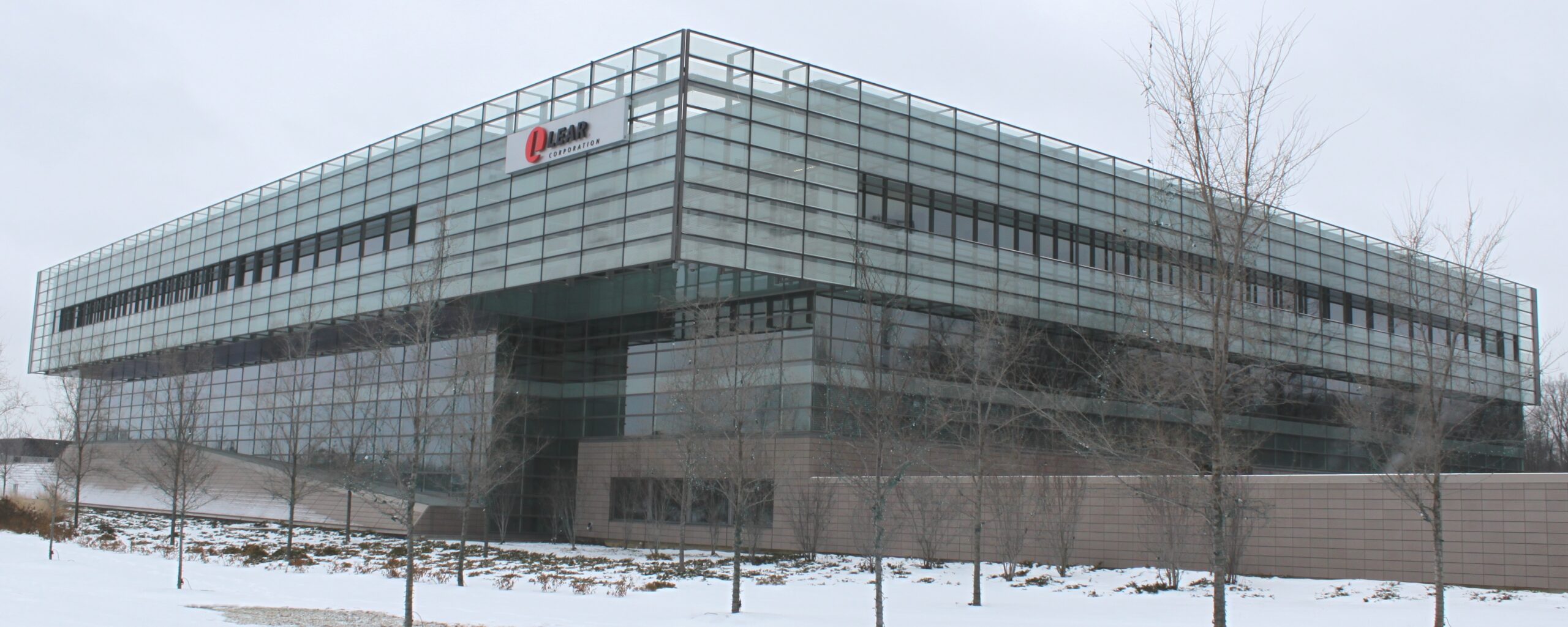 Facade of the Lear Corporation headquarters in Southfield, Michigan in winter.