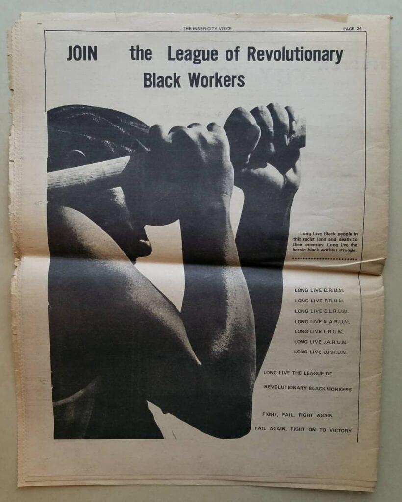 A copy of The Inner City Voice is open to a page with an image of a Black man lifting a sledgehammer. The text above the image reads "JOIN the League of Revolutionary Black Workers".